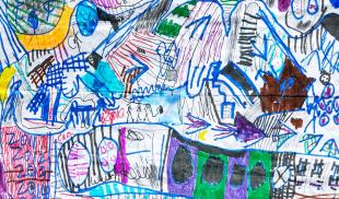 A child’s  colorful drawing of an intricate map.