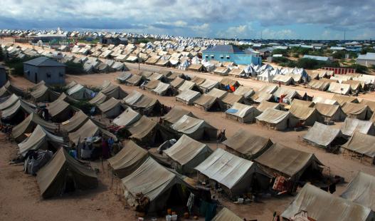 Rows of tents in a Somalian refugee camp as seen from above.