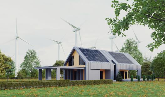 Modern eco house with solar panels and windmills to use alternative energy