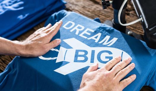 Blue t-shirt with the phrase "Dream Big"