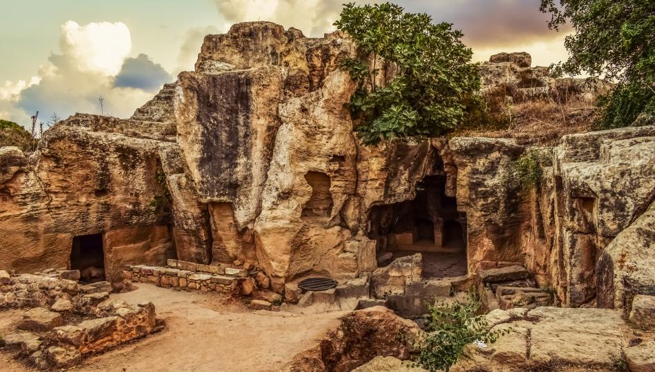 Ancient ruins cut from stone cliffs