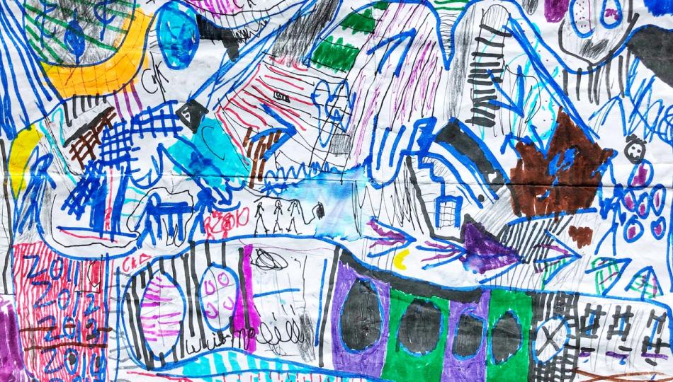 A child’s colorful drawing of an intricate map.