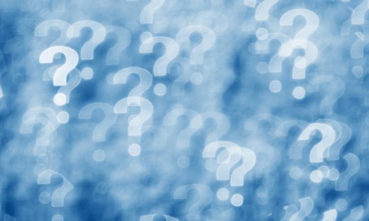 A blue and white collage of blurry question marks.