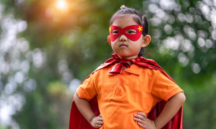 child wearing a superhero costume