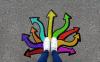 Birds eye view of a pair of shoes on cement, with multicolored arrows pointing from the shoes in different directions.