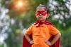 child wearing a superhero costume